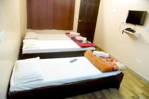 Postel nebo postele na pokoji v ubytování Hotel Parag