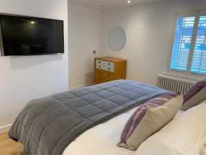 Tempat tidur dalam kamar di Griff Cottage, Skinningrove