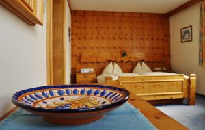 Postel nebo postele na pokoji v ubytování Landhaus Gletschermühle