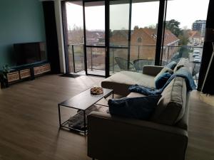 Posezení v ubytování Vakantiewoning Ijzerfront 14-18