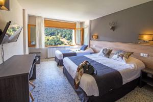 Postel nebo postele na pokoji v ubytování Hotel Austria by Pierre & Vacances + 37 fotografií