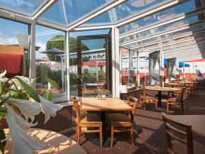 Veitingastaður eða matsölustaður á ibis 3 Lacs Neuchâtel