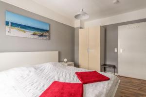 Ein Bett oder Betten in einem Zimmer der Unterkunft Haus Godewind Typ 4