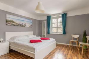 Ein Bett oder Betten in einem Zimmer der Unterkunft Haus Godewind Typ 4
