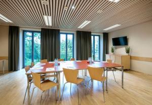 Telewizja i/lub zestaw kina domowego w obiekcie JUFA Hotel Mariazell