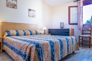Postel nebo postele na pokoji v ubytování Finca ANGOIXES by Mallorca Villa Selection