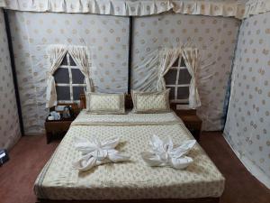 Una cama o camas en una habitación de Blue Coast beach resort