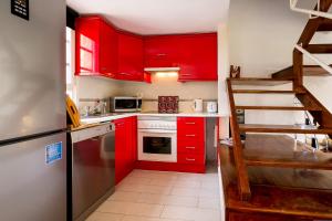 Kuchyň nebo kuchyňský kout v ubytování Bungalow Costa Adeje Cortijo 2-4