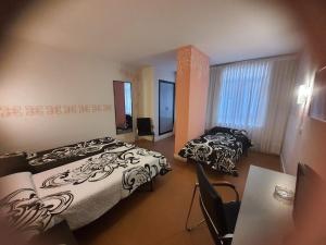 Llit o llits en una habitació de Hotel Arha Santander