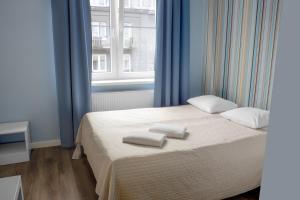 Posteľ alebo postele v izbe v ubytovaní Premium Hostel