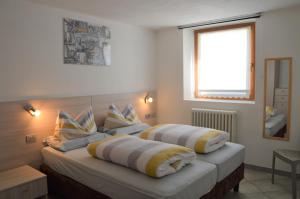 Ένα ή περισσότερα κρεβάτια σε δωμάτιο στο Chalet Aura