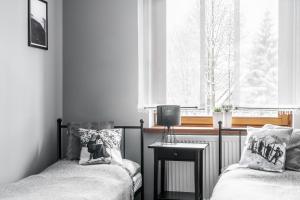 Posteľ alebo postele v izbe v ubytovaní Zielony Kątek