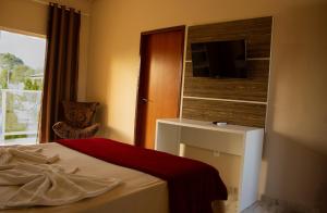 Postel nebo postele na pokoji v ubytování Hotel São Francisco