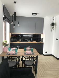 Kuchyňa alebo kuchynka v ubytovaní Apartament w Kluszkowcach nad Jeziorem Czorsztyńskim