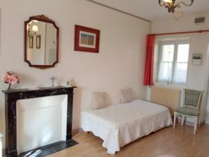 Postel nebo postele na pokoji v ubytování MAISON des FORGES