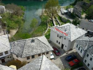 an overhead view of a building with a sign on it at Pansion Villa Nur in Mostar