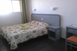 Ein Bett oder Betten in einem Zimmer der Unterkunft Primera linea playa, vista espectacular