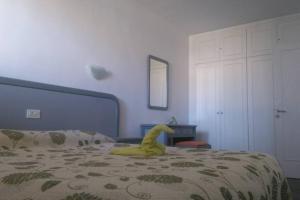 Ein Bett oder Betten in einem Zimmer der Unterkunft Primera linea playa, vista espectacular