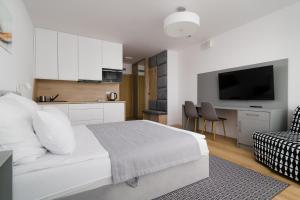 Μια τηλεόραση ή/και κέντρο ψυχαγωγίας στο Apartament "Sevach" Kołobrzeg