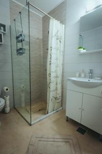 Ett badrum på View Apartament