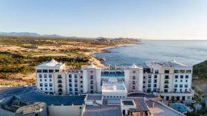an aerial view of a hotel and the ocean at Vista Encantada Resort & Spa Residences, A La Carte All Inclusive Optional in Cabo San Lucas