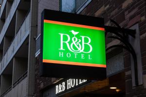 Et logo, certifikat, skilt eller en pris der bliver vist frem på R&B Hotel Higashi Nihonbashi