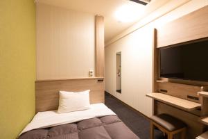 Кровать или кровати в номере R&B Hotel Higashi Nihonbashi