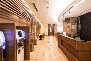 TV a/nebo společenská místnost v ubytování Washington R&B Hotel Higashi Nihonbashi