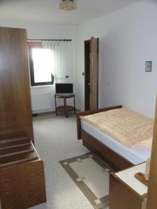 Postel nebo postele na pokoji v ubytování Hotel Die Clus