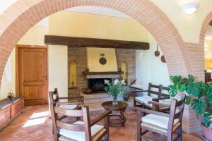 A seating area at Poderina dei Poggi 16, Emma Villas