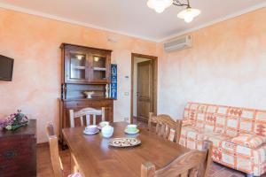 A seating area at Poderina dei Poggi 16, Emma Villas