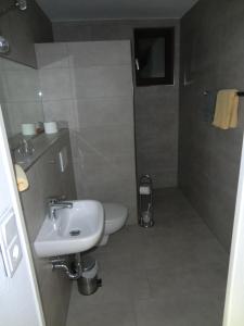 Koupelna v ubytování Hotel Die Clus