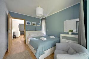 Postel nebo postele na pokoji v ubytování Ekskluzywne Apartamenty Sun Seasons 24 w Karpaczu by Noclegi Renters