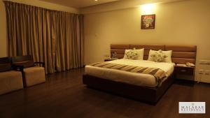Malabar Residency客房内的一张或多张床位