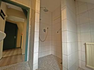 a bathroom with a shower with a mirror at Villa Prinsenhof # Zes in Bergen +48 photos