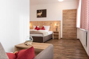 Łóżko lub łóżka w pokoju w obiekcie Pitztal Living Apartments