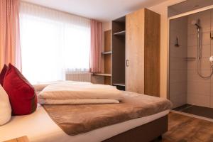 Łóżko lub łóżka w pokoju w obiekcie Pitztal Living Apartments