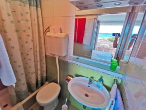 Koupelna v ubytování Apartments Vukadin