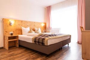 Łóżko lub łóżka w pokoju w obiekcie Pitztal Living Apartments