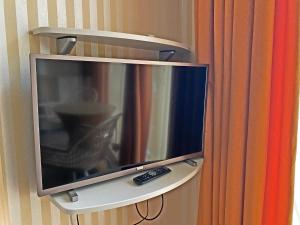 TV a/nebo společenská místnost v ubytování Villa Prinsenhof # Vierentwintig