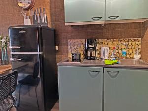 Η κουζίνα ή μικρή κουζίνα στο Villa Prinsenhof # Twaalf