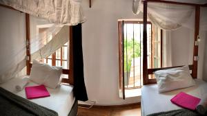 Katil atau katil-katil dalam bilik di Stone Town House
