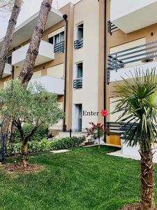 a view of the front of the building at Hanah Apartment - Gjiri Lalzit Lura 3 in Mullini i Danit
