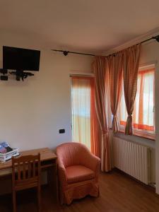 TV a/nebo společenská místnost v ubytování Hotel Culmine