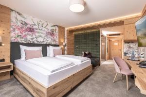 Letto o letti in una camera di 4*S Galtenberg Resort