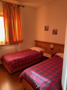 Voodi või voodid majutusasutuse Hotel Culmine toas