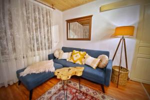 A seating area at The Secret Lodge- NEW with private GARAGE, entire house