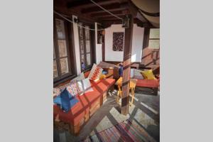 A seating area at The Secret Lodge- NEW with private GARAGE, entire house