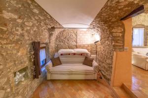 Postelja oz. postelje v sobi nastanitve Agriturismo C'era Una Volta