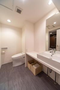 Vonios kambarys apgyvendinimo įstaigoje NIYS apartments 08 type